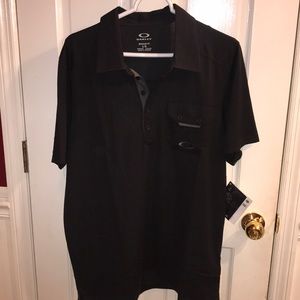 NWT Oakley black polo.  Size Large